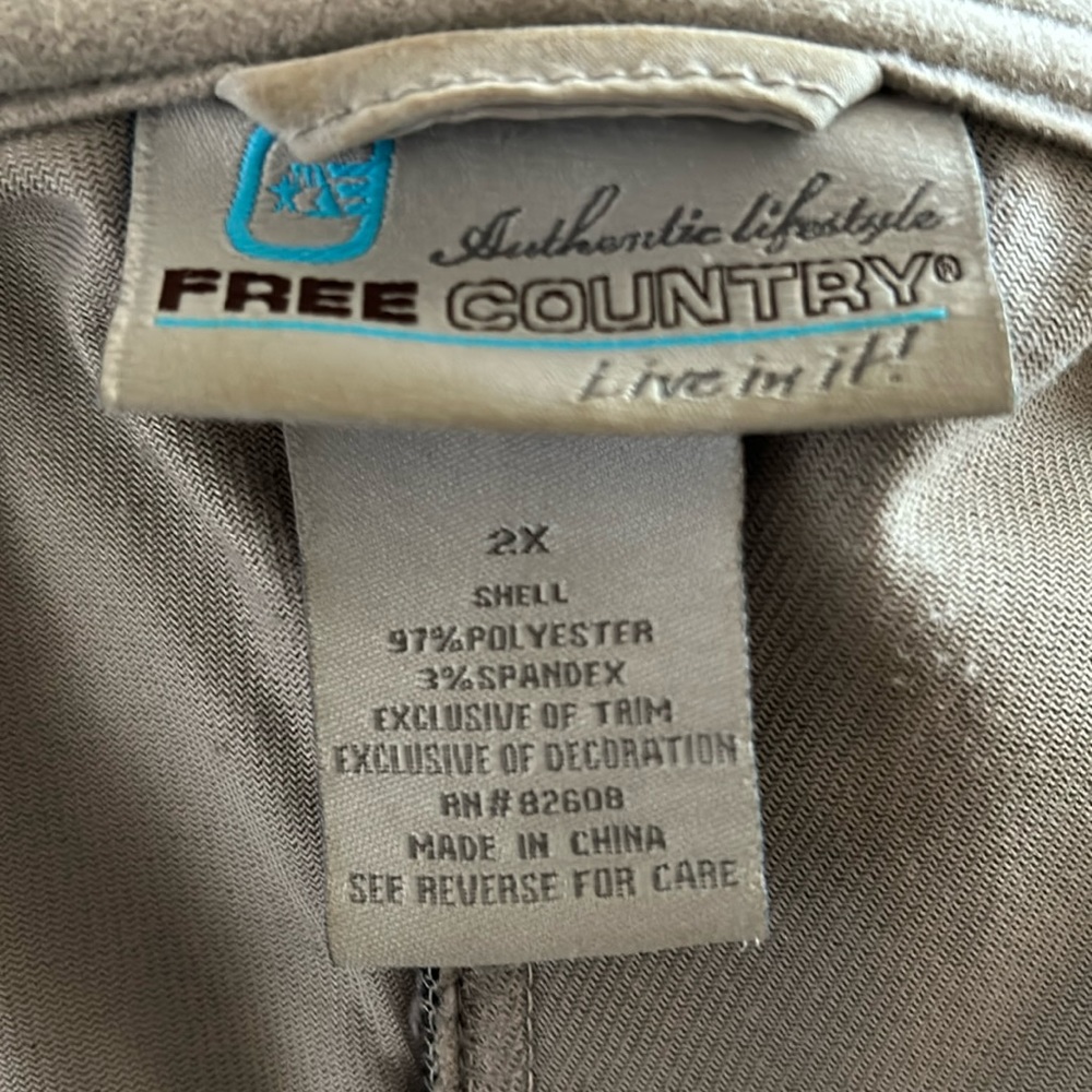 Free Country Black Women’s winter coat. Not too heavy. Has hood, deep pockets.
